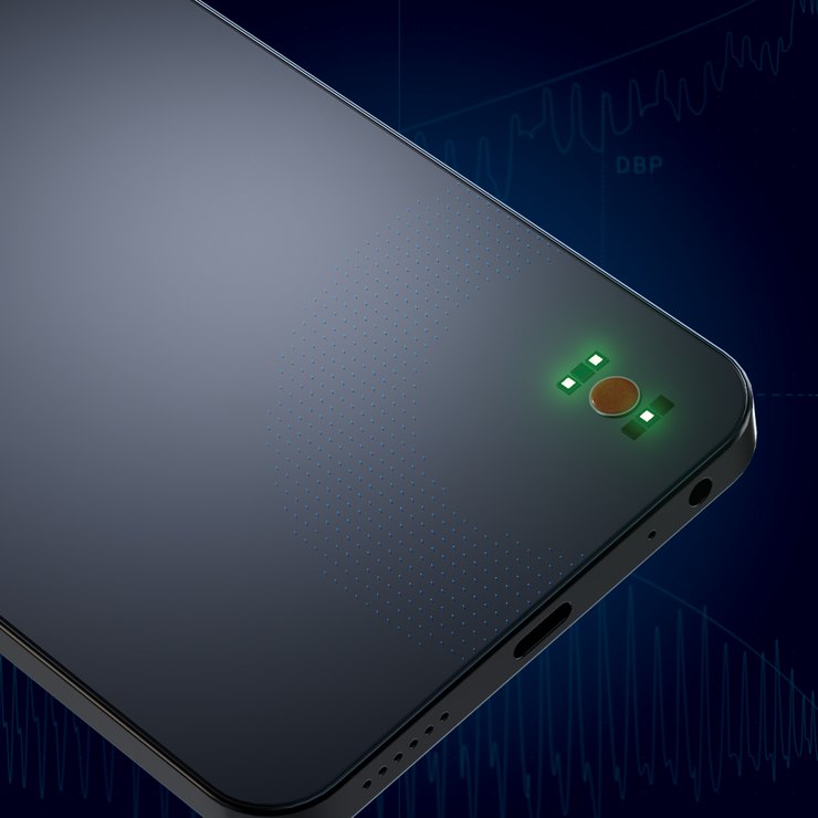 The back of a smartphone with a built-in sensor, a round pad between green lights, over faint blood pressure waveforms.